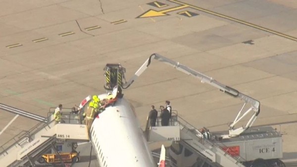 Extinction Rebellion protester climbs on plane at London City Airport
Extinction Rebellion protester climbs on plane at London City Airport