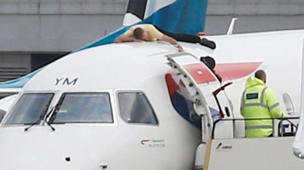 Extinction Rebellion protester climbs on plane at London City Airport
Extinction Rebellion protester climbs on plane at London City Airport