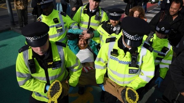 Extinction Rebellion protester climbs on plane at London City Airport
Extinction Rebellion protester climbs on plane at London City Airport