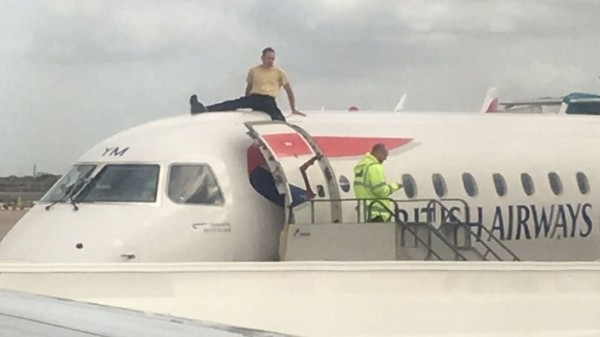 Extinction Rebellion protester climbs on plane at London City Airport
Extinction Rebellion protester climbs on plane at London City Airport