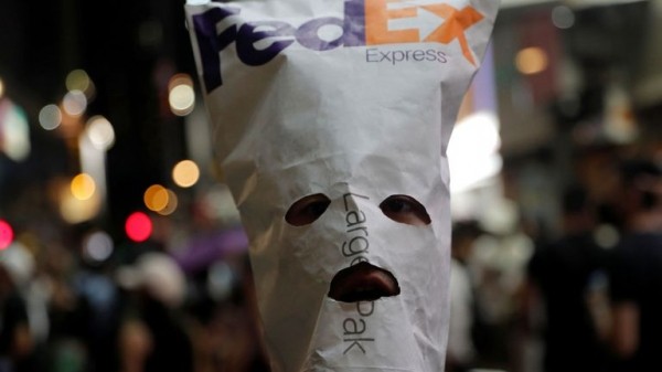 
Hong Kong: Boy shot as protesters ignore face mask ban on another night of violence
