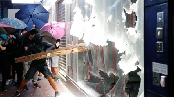 
Hong Kong: Boy shot as protesters ignore face mask ban on another night of violence
