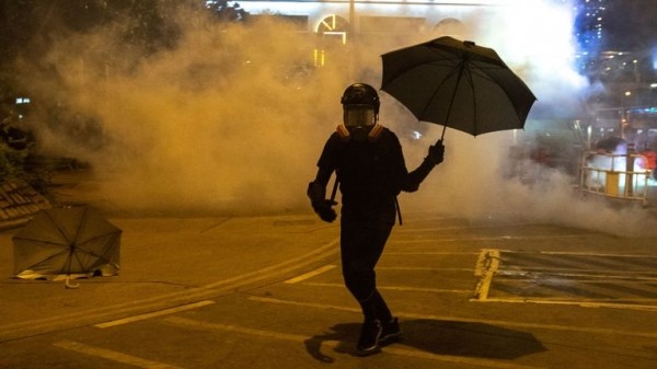 
Hong Kong: Boy shot as protesters ignore face mask ban on another night of violence
