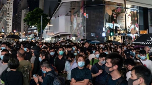 
Hong Kong: Boy shot as protesters ignore face mask ban on another night of violence
