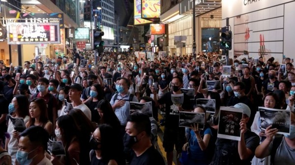 
Hong Kong: Boy shot as protesters ignore face mask ban on another night of violence
