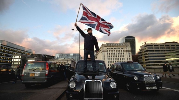 Uber fights rearguard action as regulators weigh London ban
Uber fights rearguard action as regulators weigh London ban