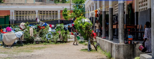 Desks become beds as Haitian school shelters people displaced by violence
Desks become beds as Haitian school shelters people displaced by violence