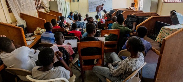 Desks become beds as Haitian school shelters people displaced by violence
Desks become beds as Haitian school shelters people displaced by violence